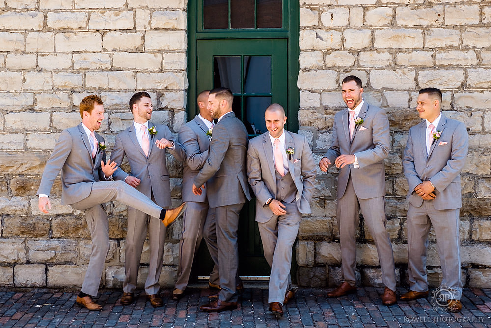 fun and candid groomsmen photos distillery toronto