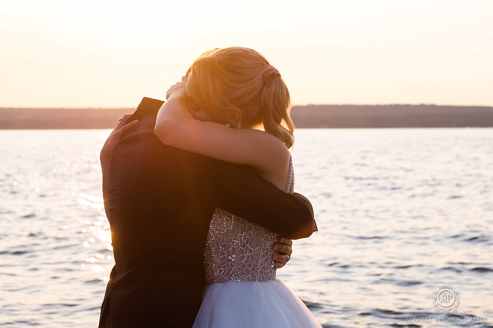 a romantic backyard wedding bride and groom at sunset