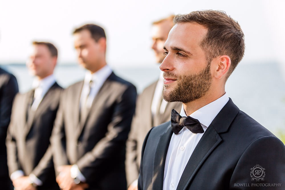 a romantic backyard wedding groom at ceremony